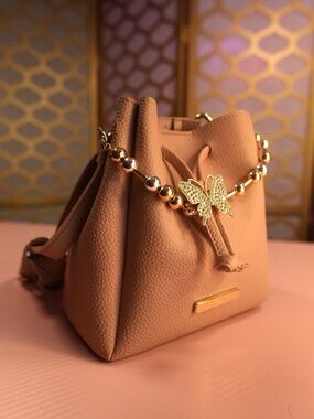 Gorgeous Pink Drawstring Bucket Bag with Butterfly Accent